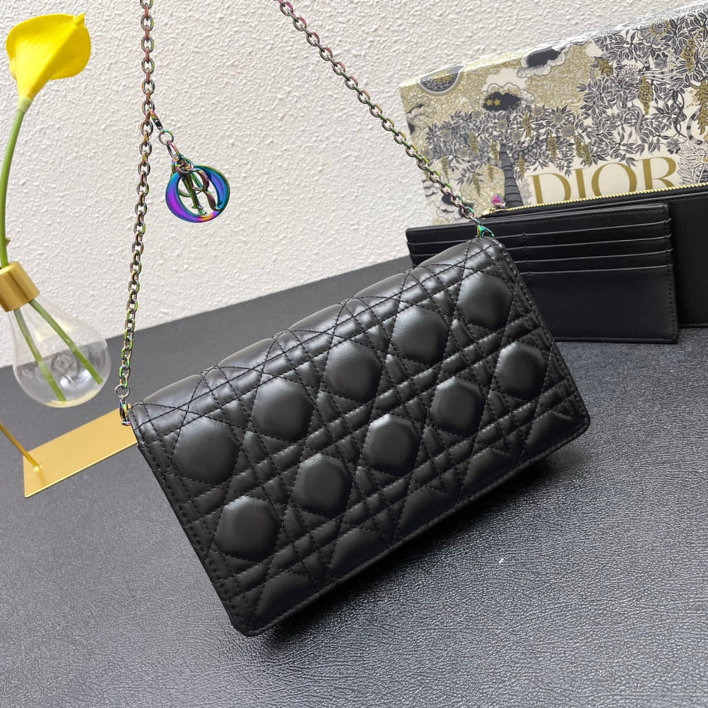 CARO SLIM POUCH 21 BAG IN BLACK CALFSKIN