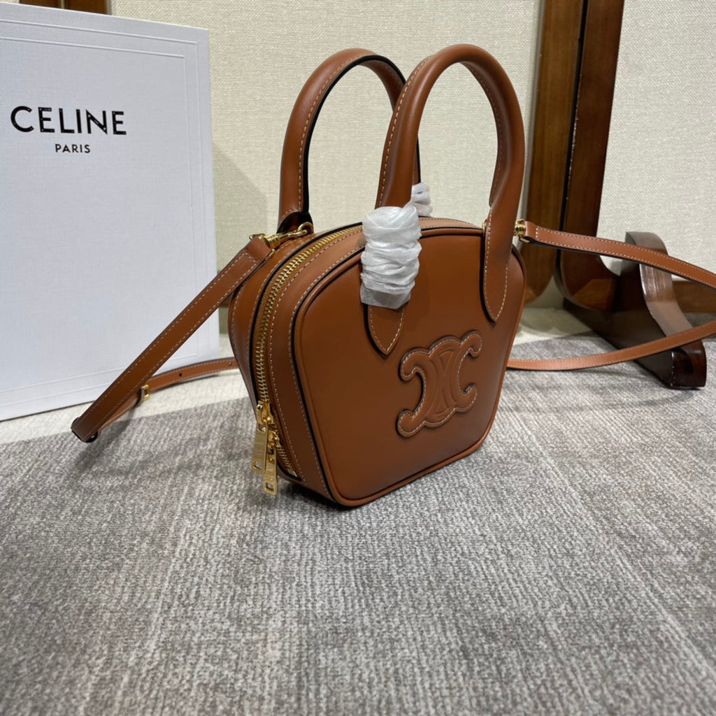 TRIOMPHE TOP HANDLE BAG 20 IN BRONZE BROWN CALFSKIN