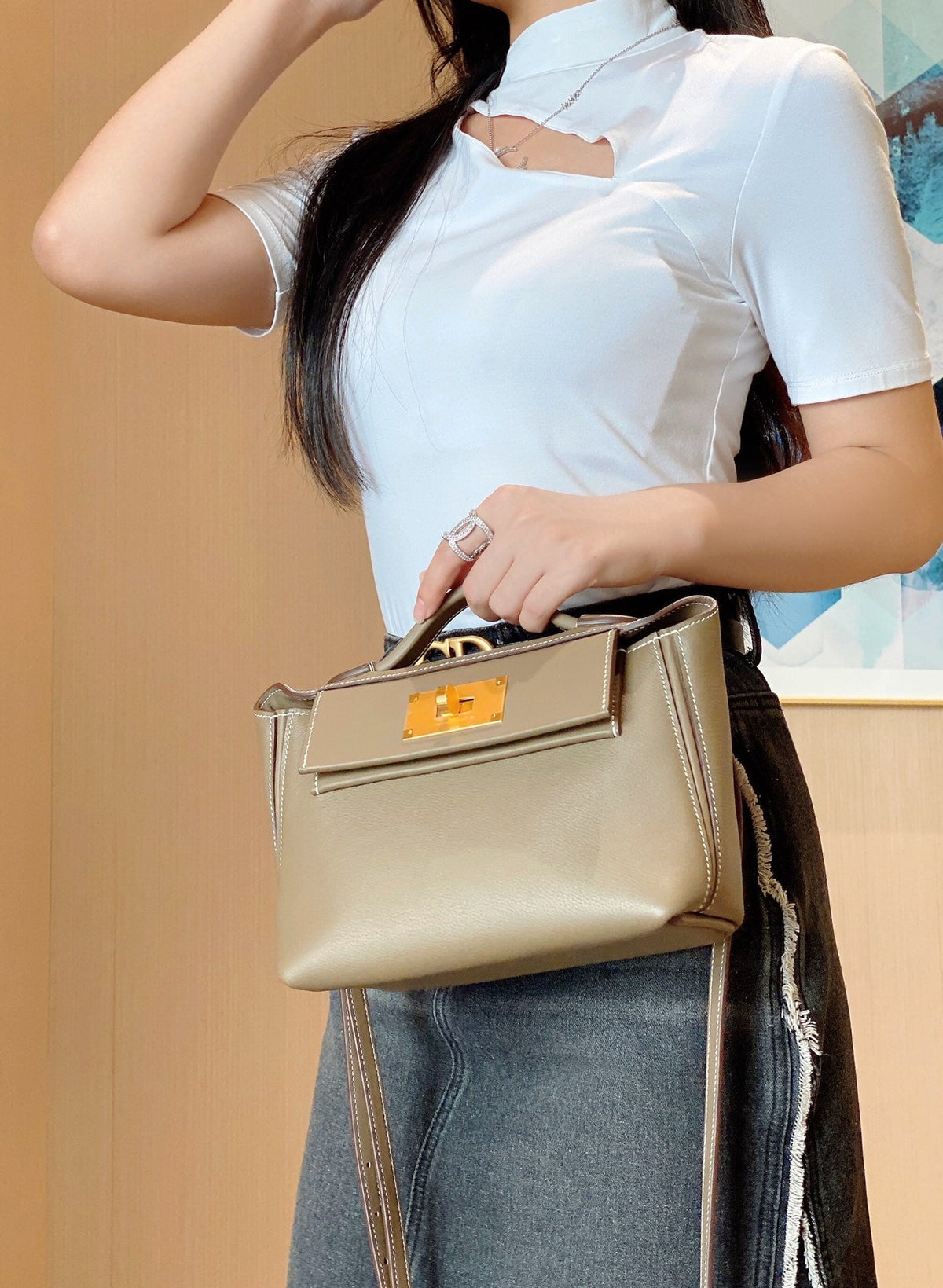 MINI 24/24 21CM IN TOGO ETOUPE EVERCOLOR CALFSKIN GOLD KELLY BUCKLE