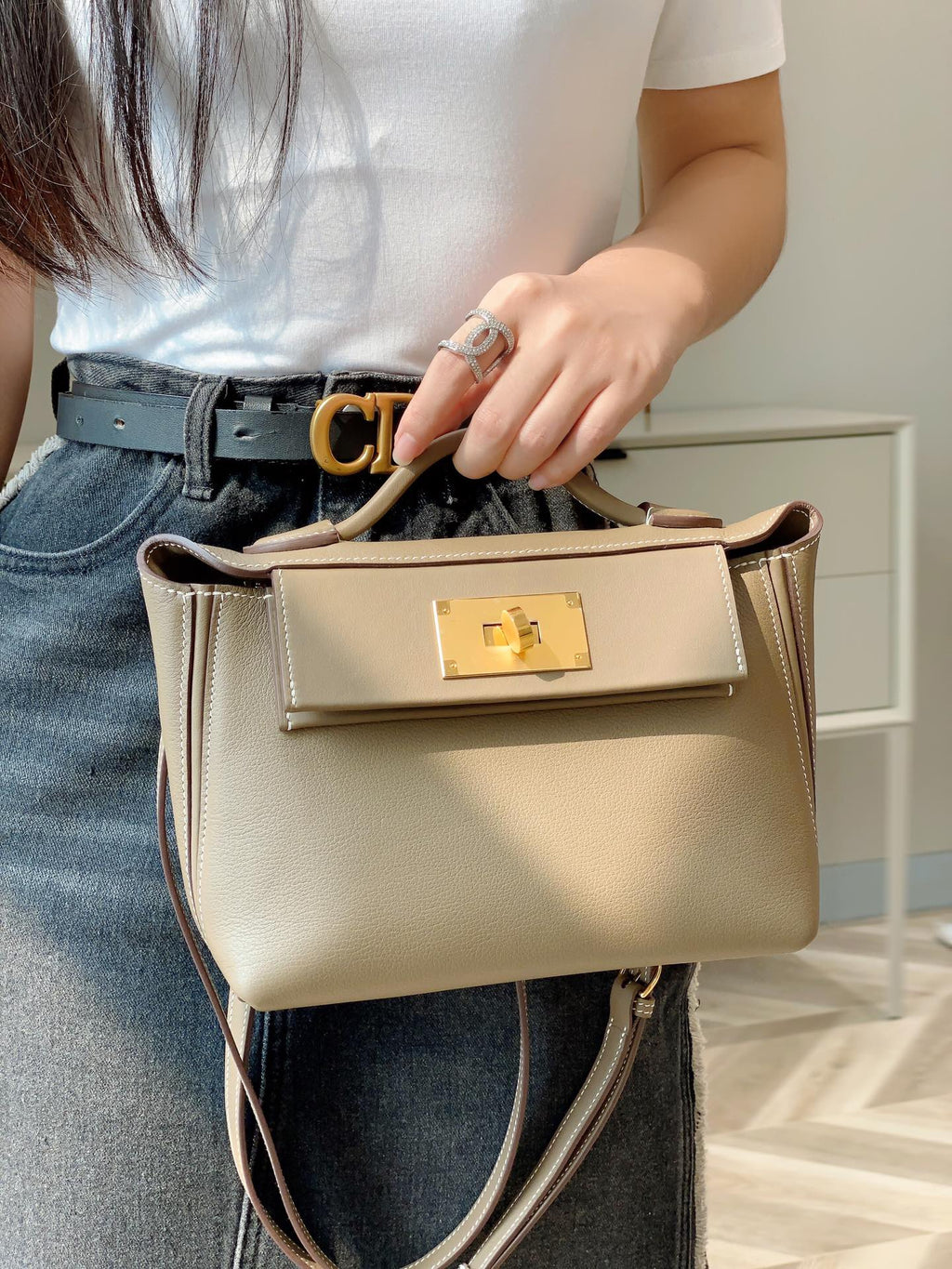 MINI 24/24 21CM IN TOGO ETOUPE EVERCOLOR CALFSKIN GOLD KELLY BUCKLE