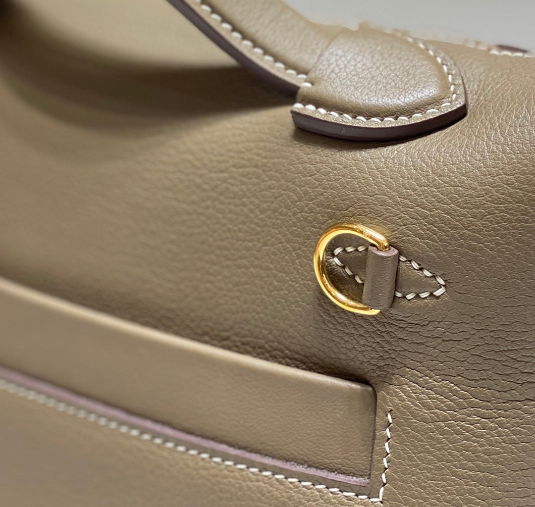 MINI 24/24 21CM IN TOGO ETOUPE EVERCOLOR CALFSKIN GOLD KELLY BUCKLE