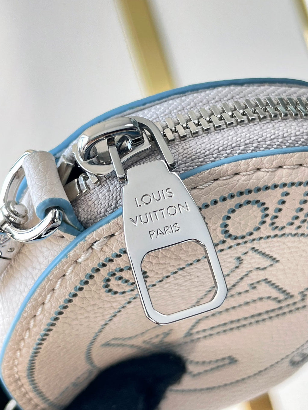 BELLA 22 IN WHITE PERFORATED CALFSKIN SILVER HARDWARE