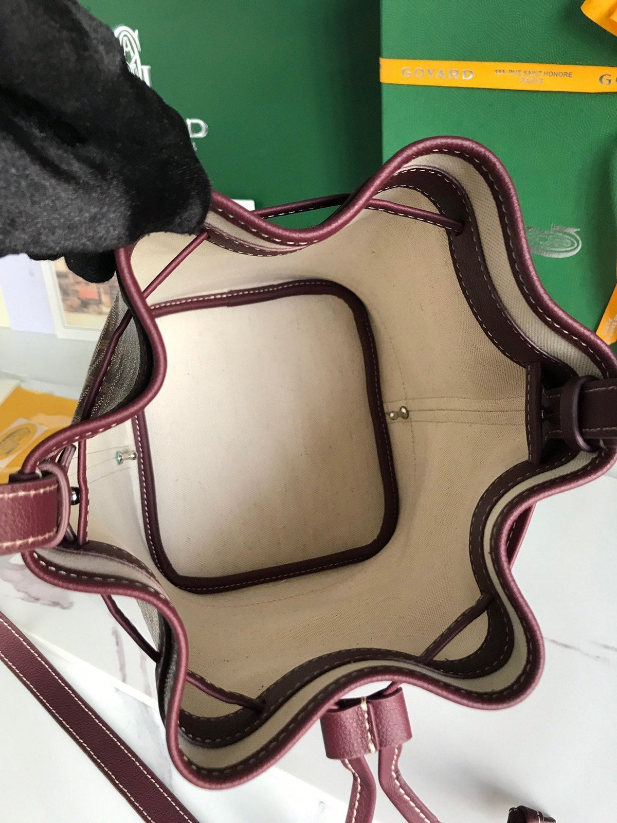PETIT FLOT BUCKET BAG 22 IN WINE RED GOYARDINE CANVAS AND LAMBSKIN TRIM