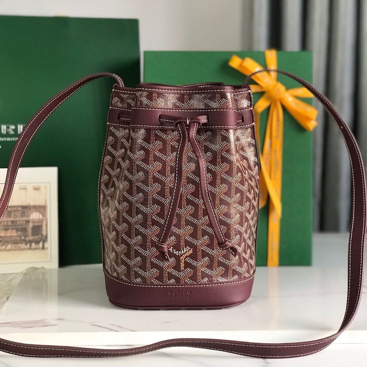 PETIT FLOT BUCKET BAG 22 IN WINE RED GOYARDINE CANVAS AND LAMBSKIN TRIM