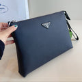 CLUTCH 29 IN NAVY BLUE GRAINED CALFSKIN TRIANGLE LOGO