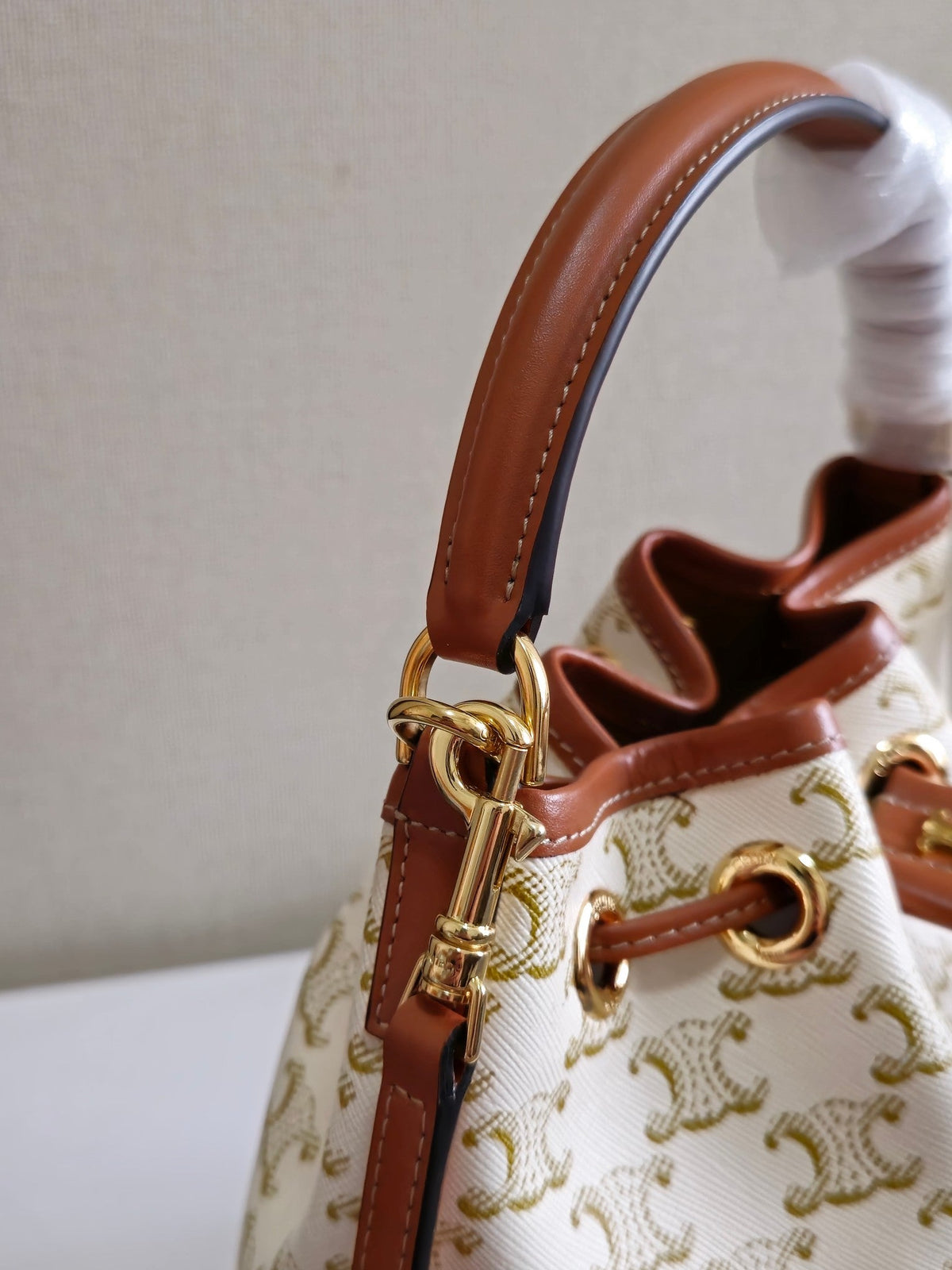 CLARA BAG 19 IN WHITE TRIOMPHE CANVAS AND BROWN CALFSKIN TRIM