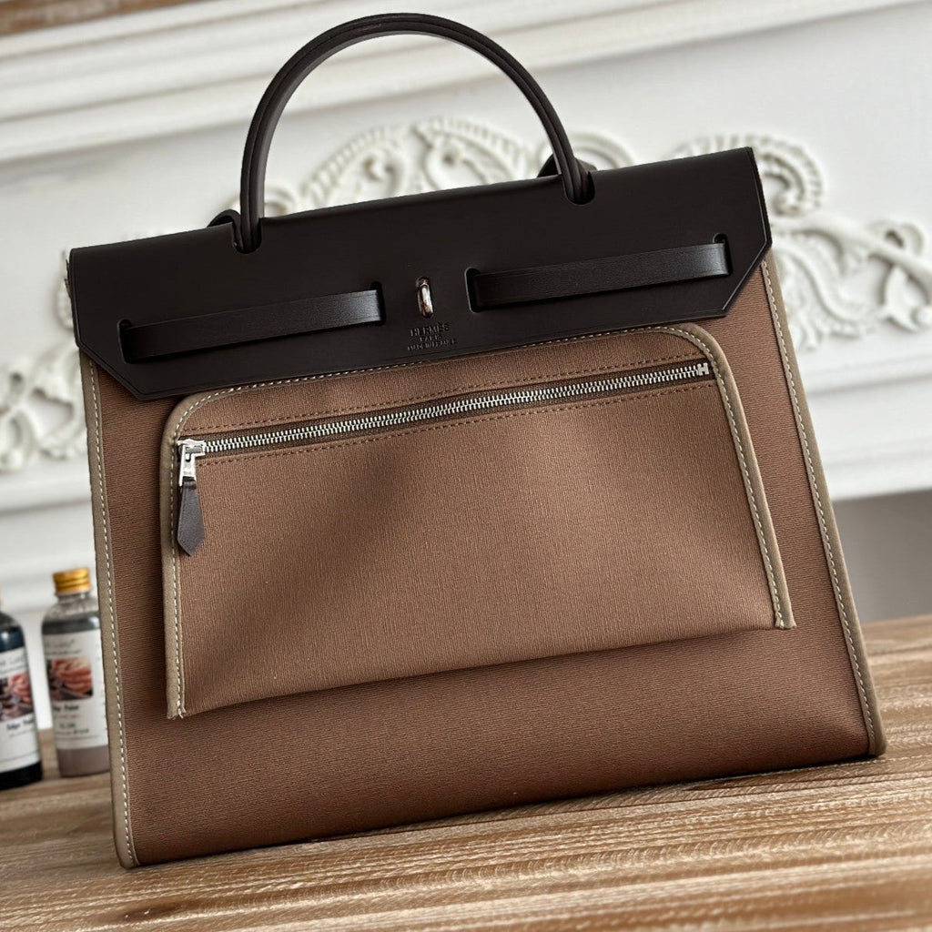 ZIP CABINE 31 BAG IN CHOCOLATE BROWN CANVAS AND BLACK CALFSKIN