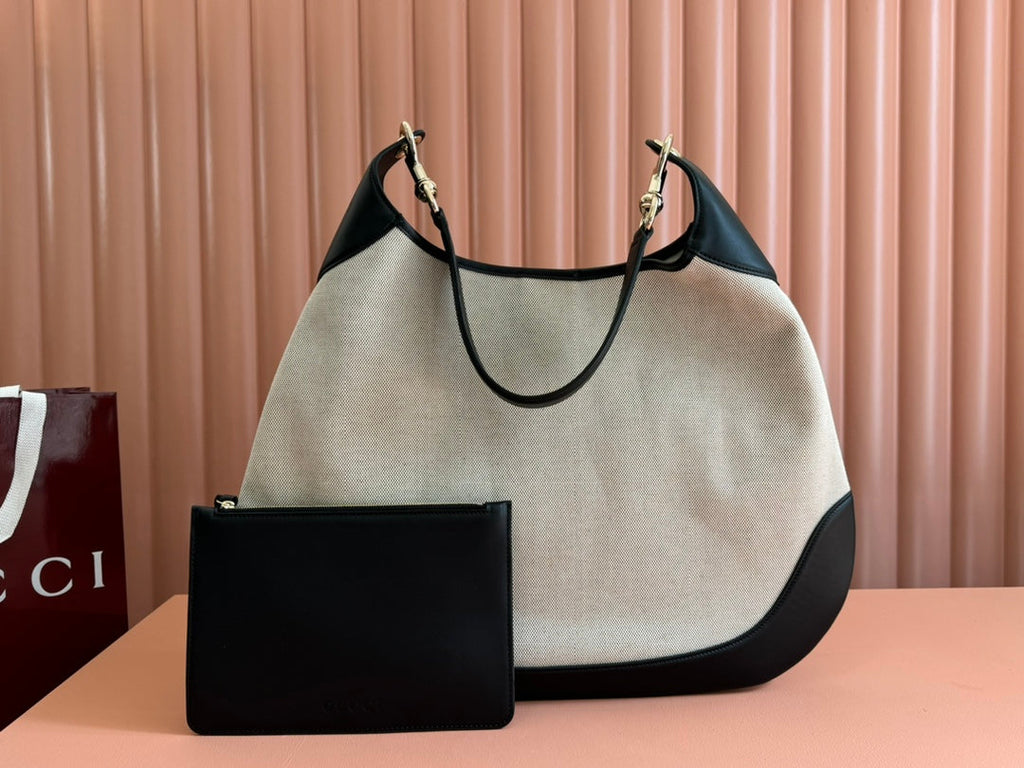BODY MEDIUM SHOULDER BAD 49 IN NATURAL CANVAS AND BLACK CALFSKIN GOLD HARDWARE