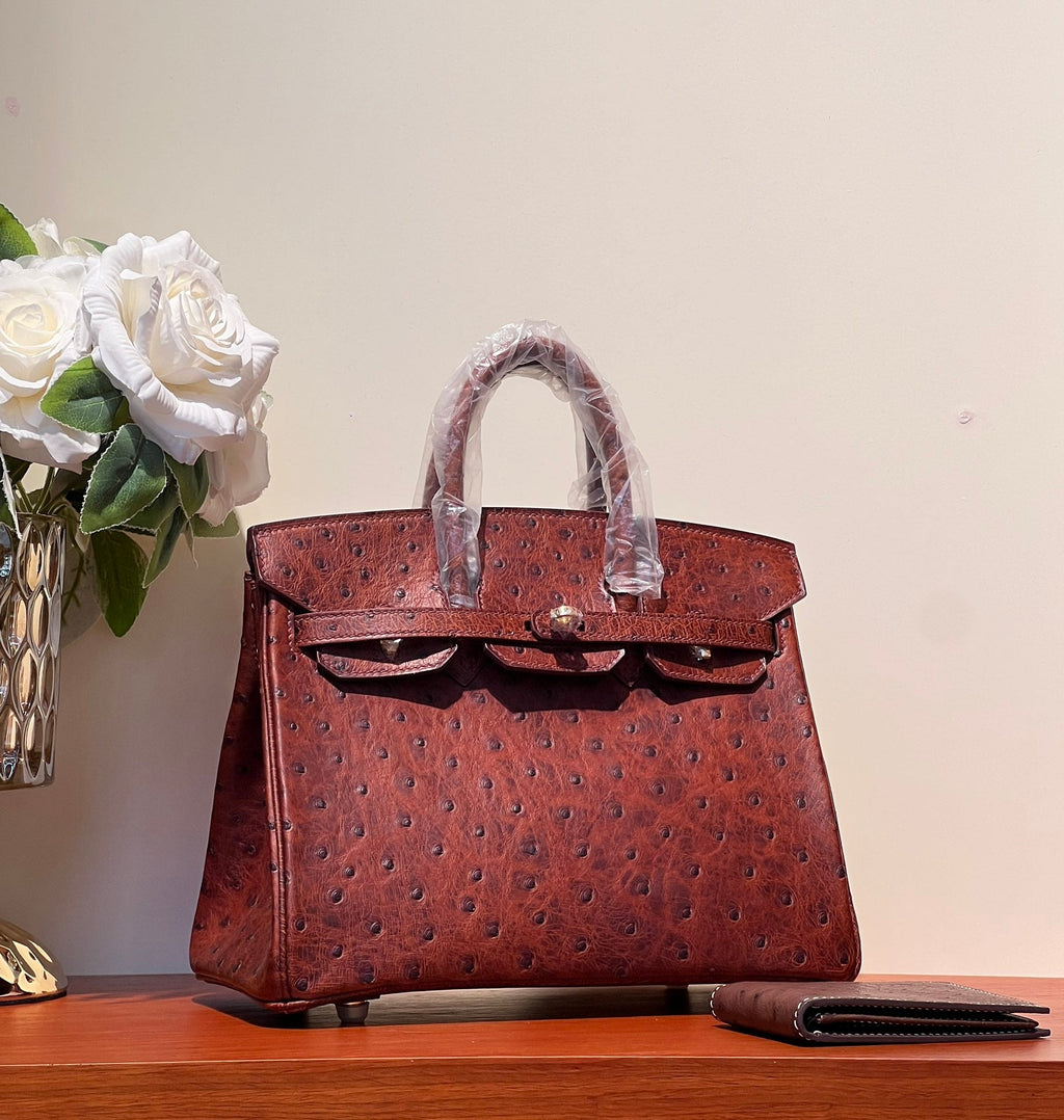 KELLY SELLIER 25 BAG IN BERRY RED OSTRICH LEATHER WITH GOLD HARDWARE